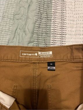 Two Carhartt Relaxed Fit 9i inch shorts.